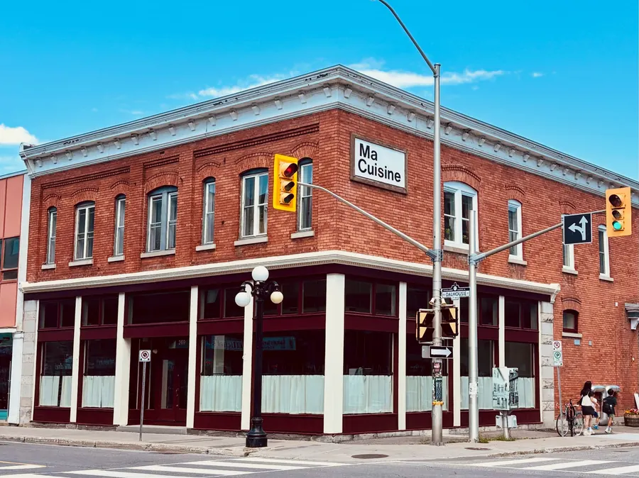 Red-brick corner building in the ByWard Market with a Ma Cuisine sign